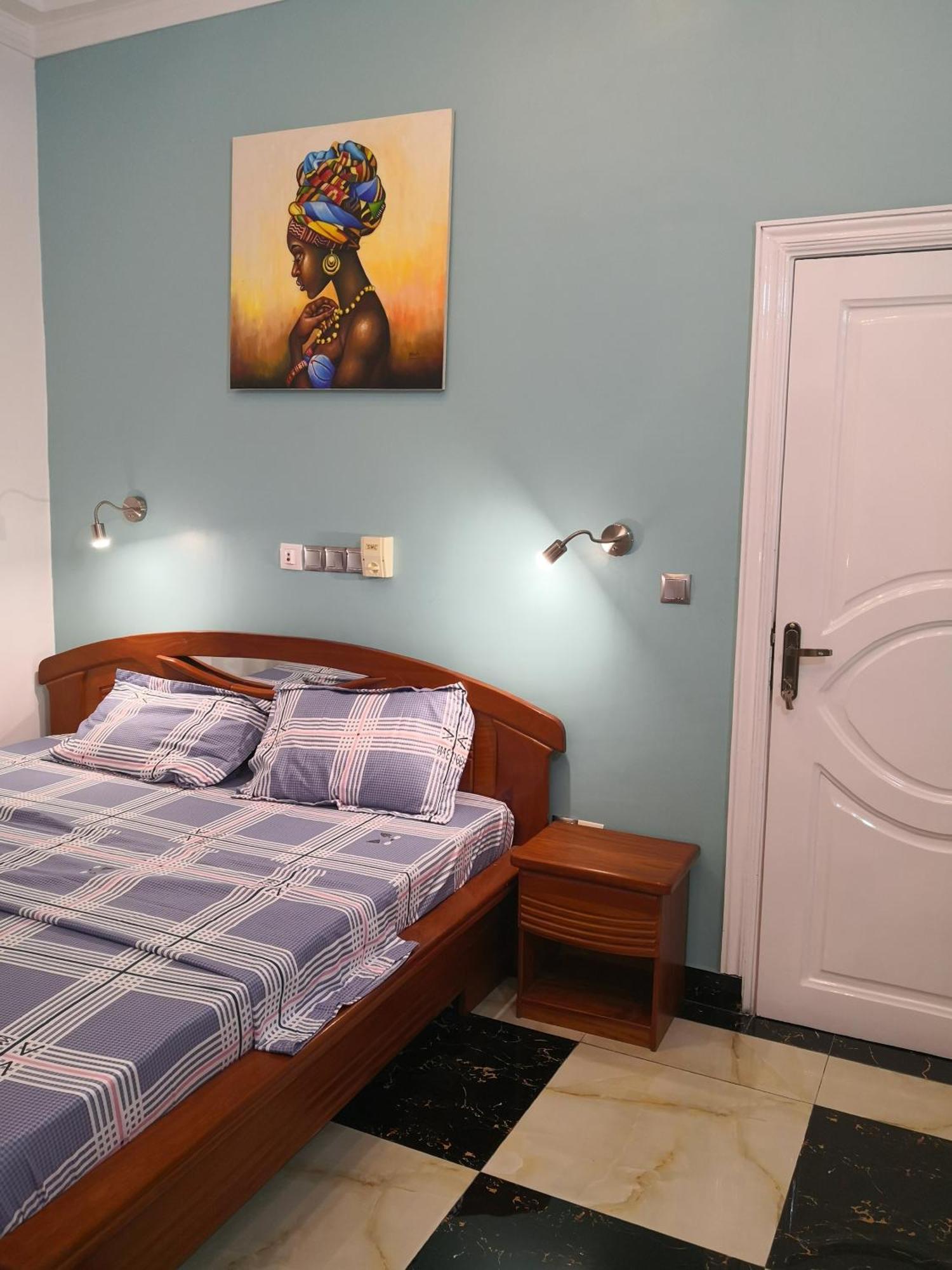 Residence Palais Du Stade Cotonou Quarto foto